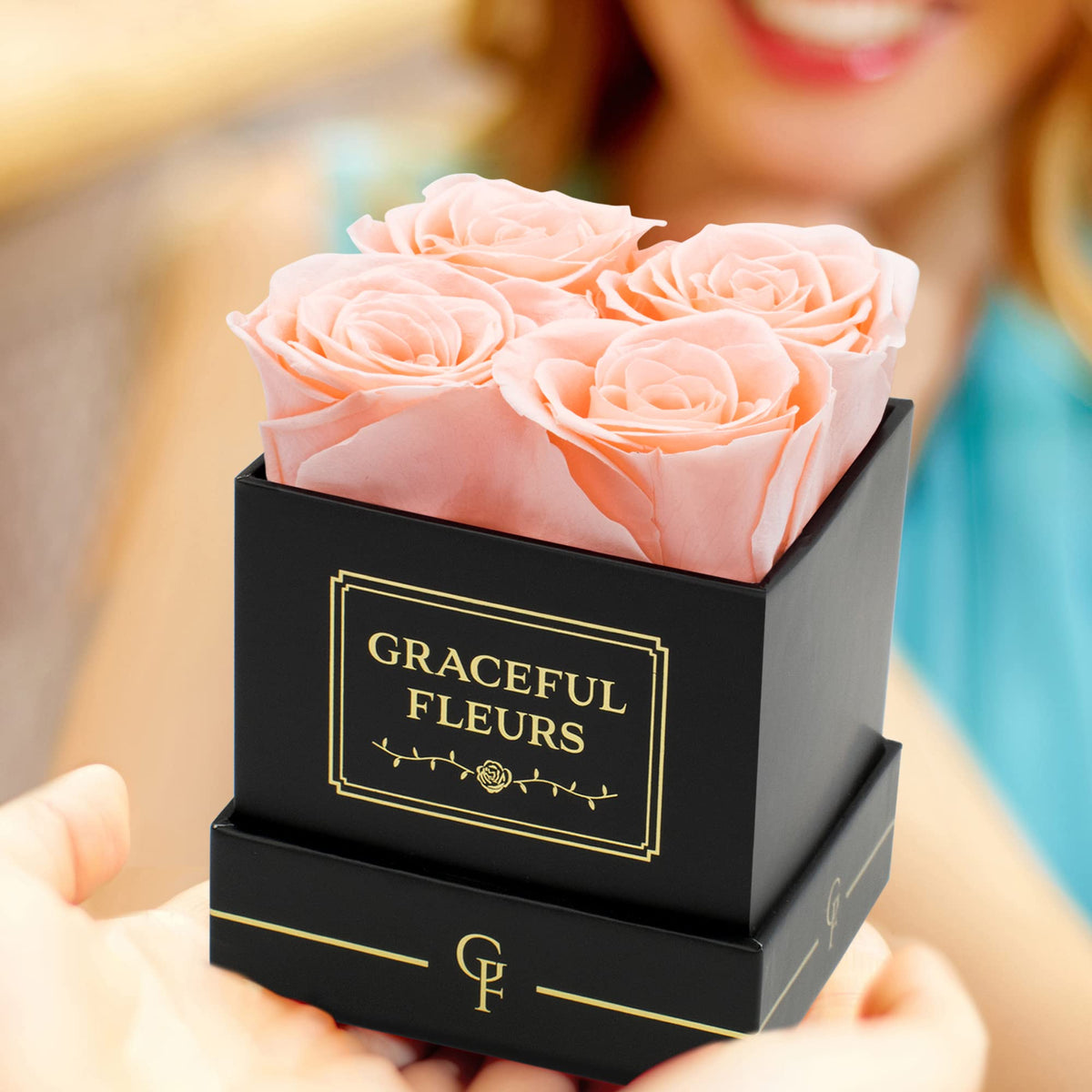 Chloe's Graceful Fleurs bow-tied gift box with eternal roses for moments.