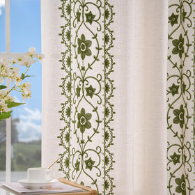 Chorowl Sage Green linen drapes offering privacy and light filtering.