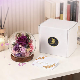 ChosiaRose preserved rose dome serves as a striking desk or centerpiece.