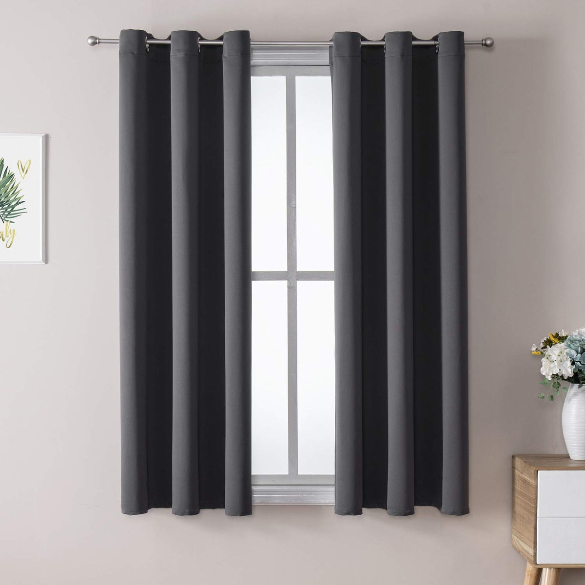 ChrisDowa blackout curtains with 2 panels and grommets ready for installation.