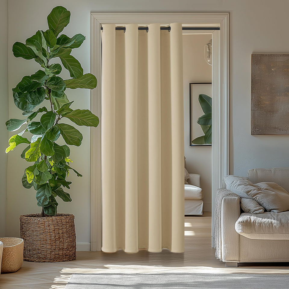 ChrisDowa blackout curtain panel in biscotti beige blocks light and enhances privacy.