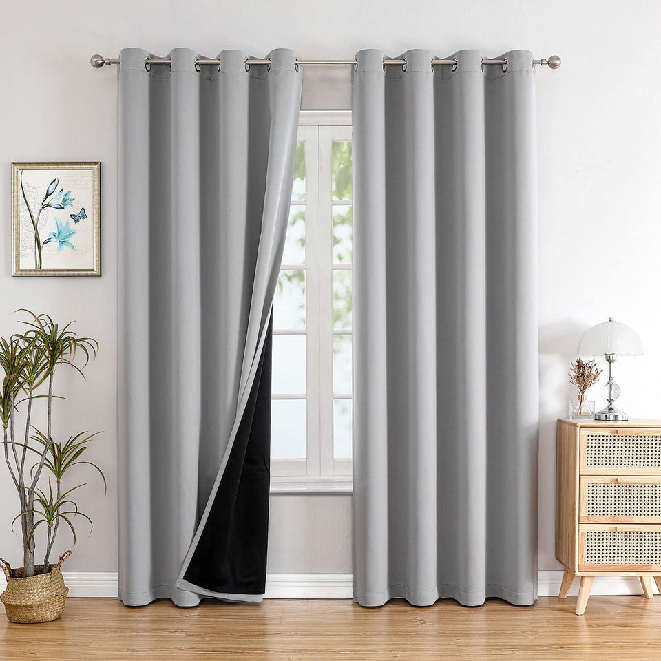 ChrisDowa blackout curtains front view in light gray blocking daylight