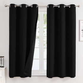 ChrisDowa blackout curtains two-panel setup for a sleek, darkened room and improved evening privacy