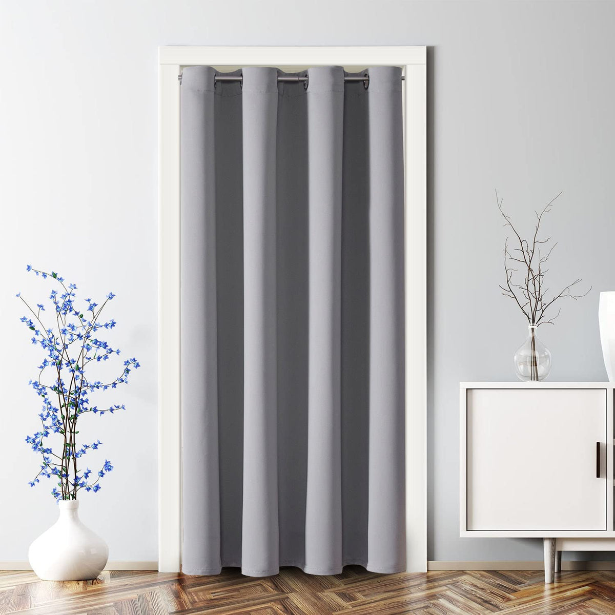 ChrisDowa blackout door curtain in light grey blocks light for doorway privacy.