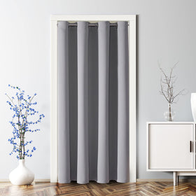 ChrisDowa blackout door curtain in light grey blocks light for doorway privacy.