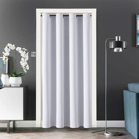 ChrisDowa blackout door curtain in greyish white blocks light for privacy.