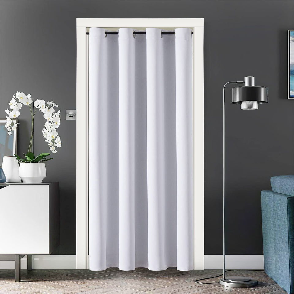 ChrisDowa blackout door curtain in greyish white blocks light for privacy.