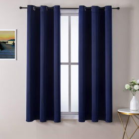 ChrisDowa grommet blackout curtains in navy block light for better sleep.