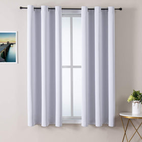ChrisDowa grommet curtains two-panel setup ready to hang on living room windows