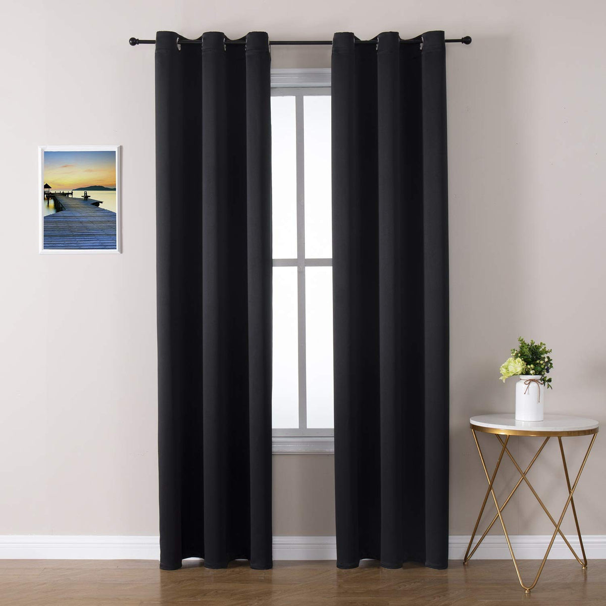 ChrisDowa grommet curtains duo-panels provide living room privacy.
