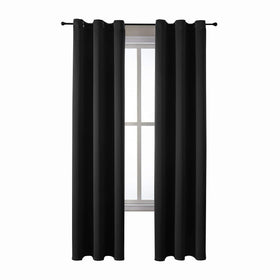 ChrisDowa grommet curtains enhance ambiance while reducing glare.