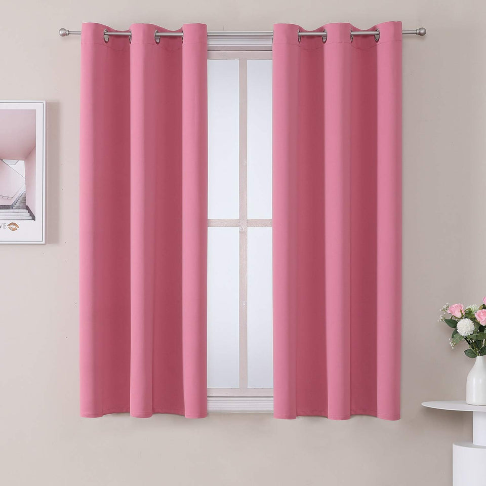 ChrisDowa grommet curtains pink panel close-up highlighting soft fabric.