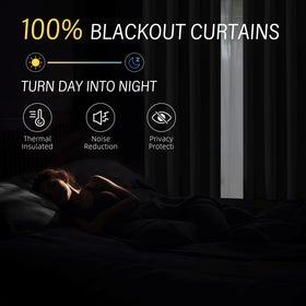 ChrisDowa linen-look blackout curtains add soft texture to the bedroom décor.