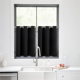 ChrisDowa curtains close-up shows sturdy silver grommets for smooth sliding.
