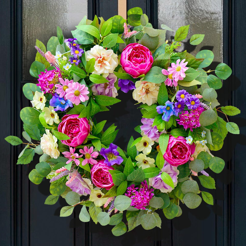 CHvista spring wreath on front door with pink peony and blue hydrangeas enhances curb appeal.