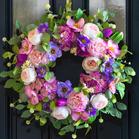 CHvista spring wreath on the front door with blush pink roses for year-round curb appeal