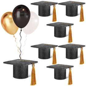 Cinnvoice graduation cap balloon weight secures balloons, ideal for festive table decor.