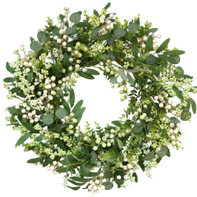 Cir Oases green eucalyptus wreath on front door enhances curb appeal and year-round style.