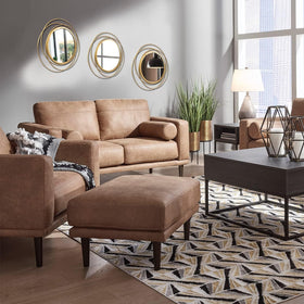 Cityelf sunburst-style gold mirror accent enhances living room ambiance