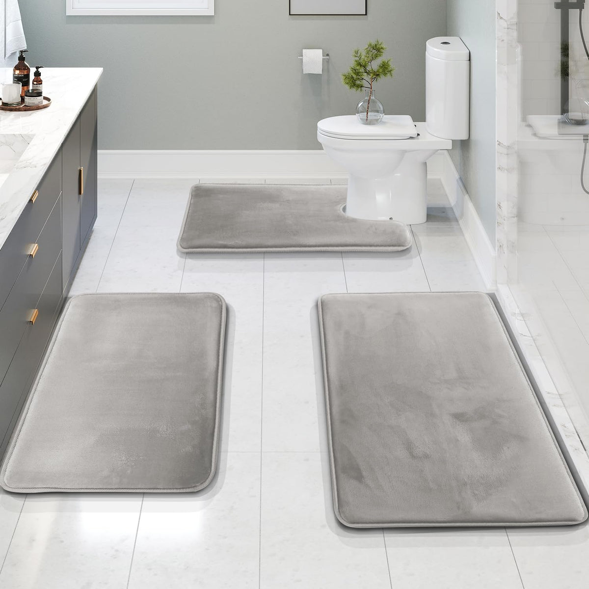 Clara Clark 3-piece bath rug set with non-slip backing for safety.
