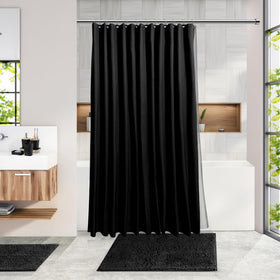 Clara Clark black toilet brush holder stores essentials neatly.