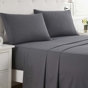 Clara Clark deep-pocket fitted sheet in charcoal gray secures tall mattresses.