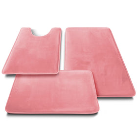 Clara Clark fast-drying pink bath mat minimizes dampness after showers.