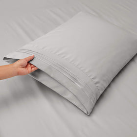 Fitted sheet with 34-inch top cut to fit an extra-thick top split king mattress.