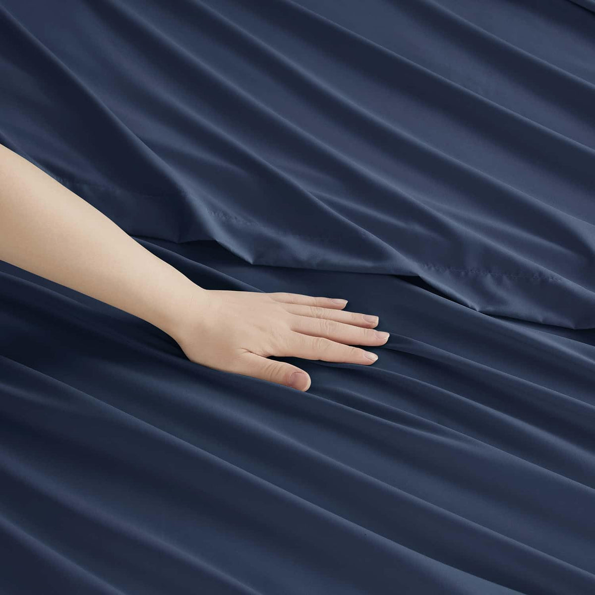 Clara Clark microfiber texture close-up navy, showcasing silky softness.
