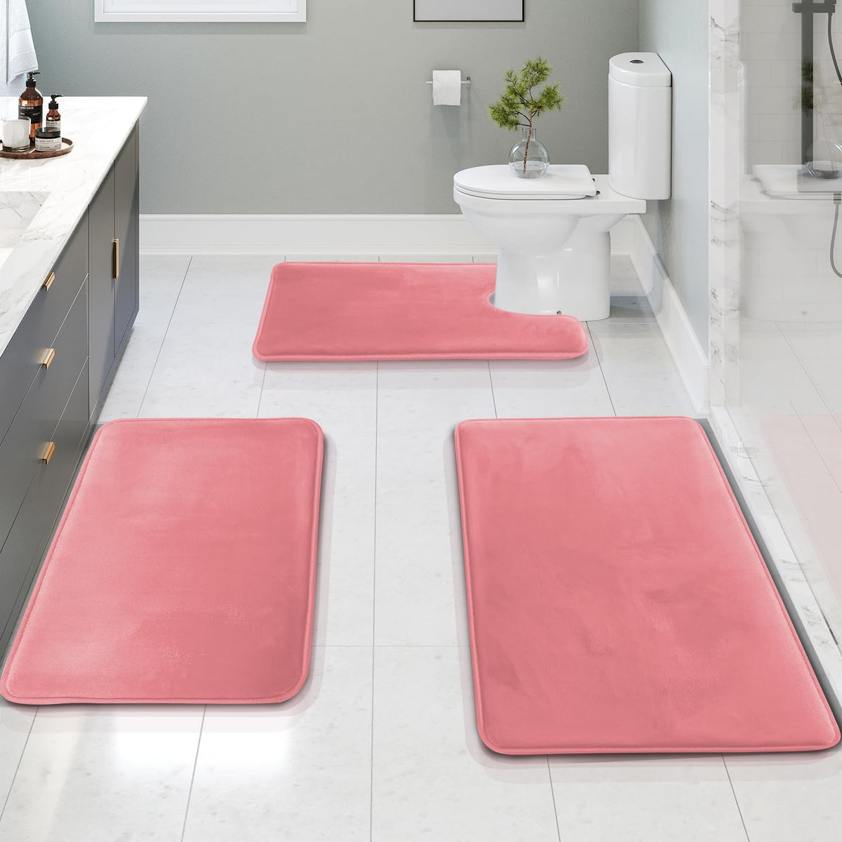Clara Clark small pink velvet memory foam bath rug offers plush footing on cold mornings.