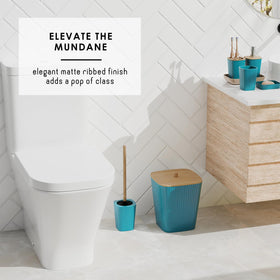 Clara Clark teal toilet brush holder blends neatly with decor.