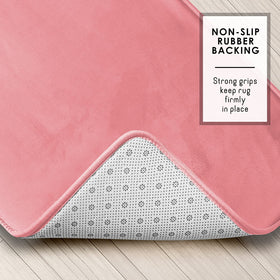 Clara Clark velvet fleece pink bath rug showcases soft texture for a cozy bathroom accent.
