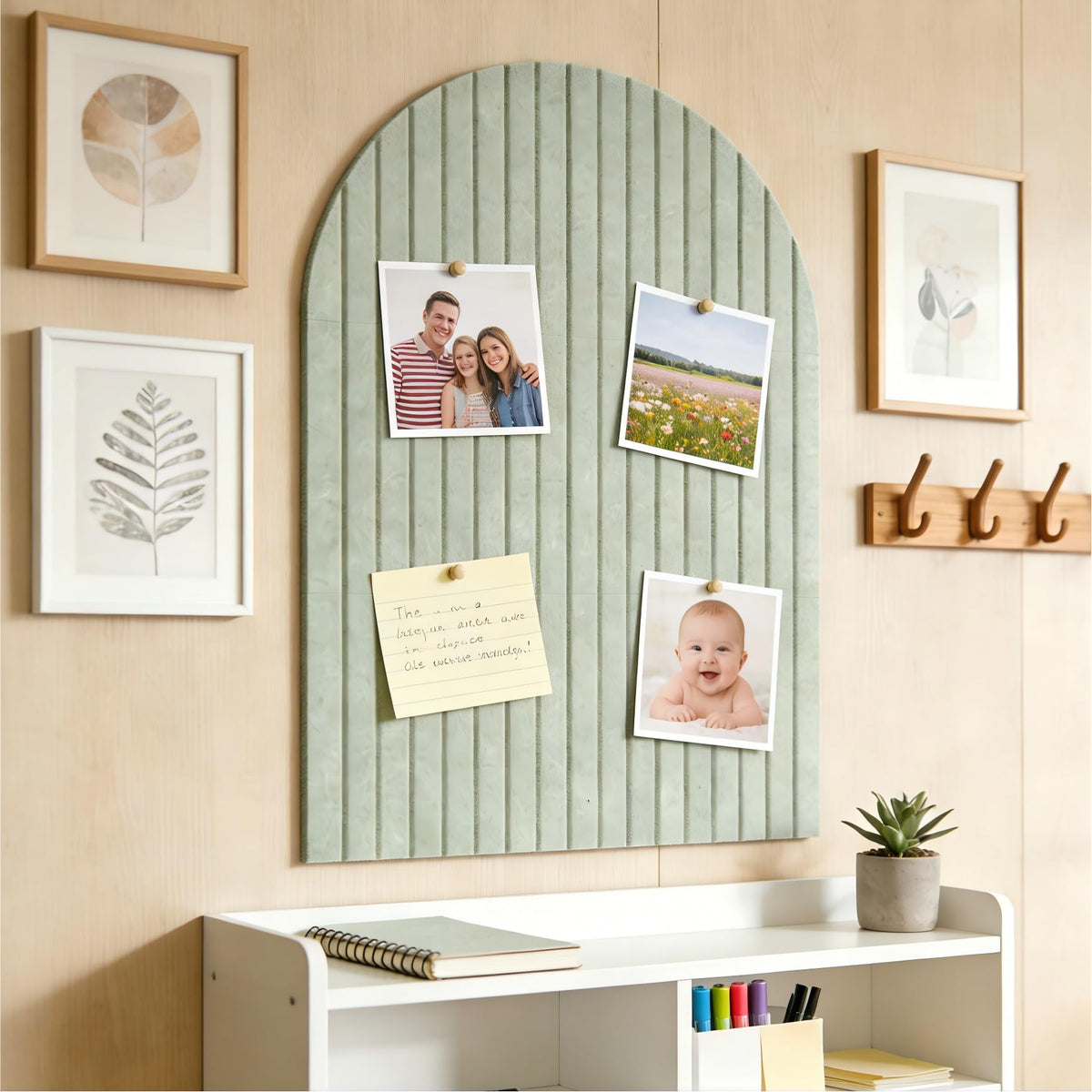 Clavorae photo wall display in sage green to organize memories.