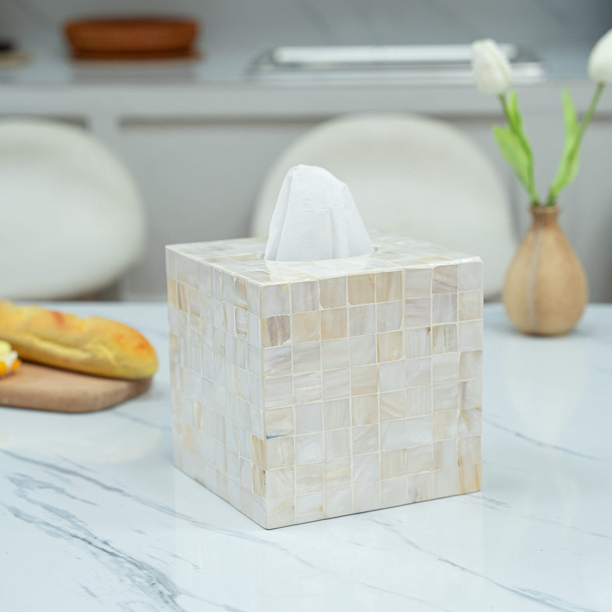 Secure bottom design keeps tissues in place during movement with CLAYNIX cover.