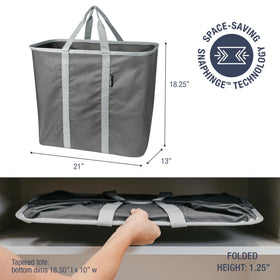 CleverMade collapsible laundry caddy collapsed flat for compact storage.