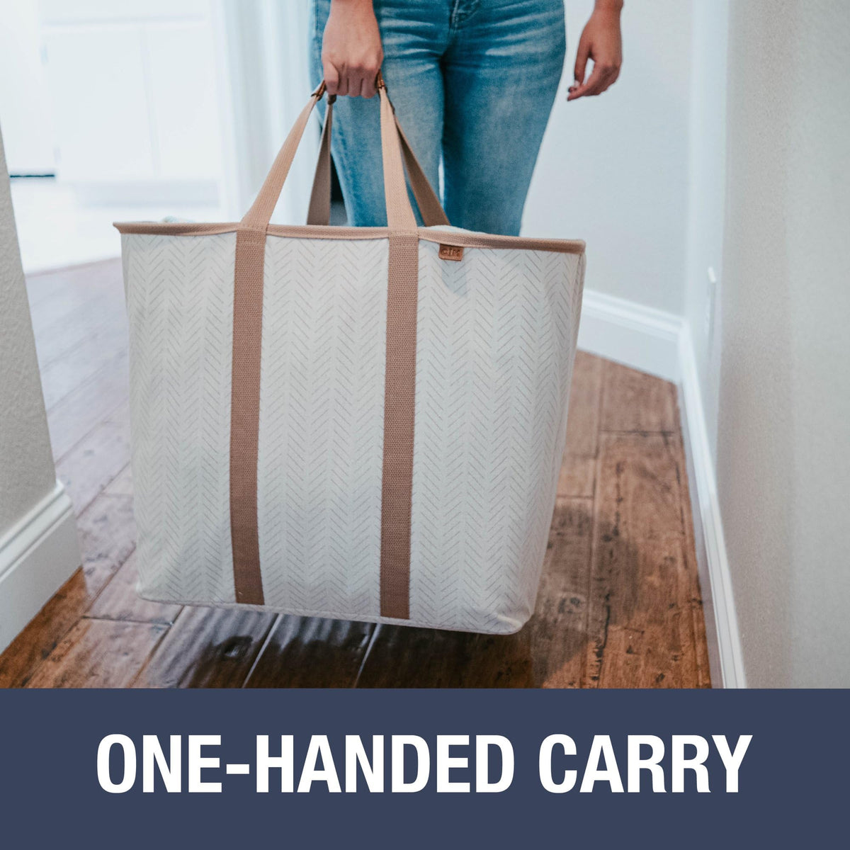 CleverMade laundry caddy pop-up design stays open for easy loading and sorting.
