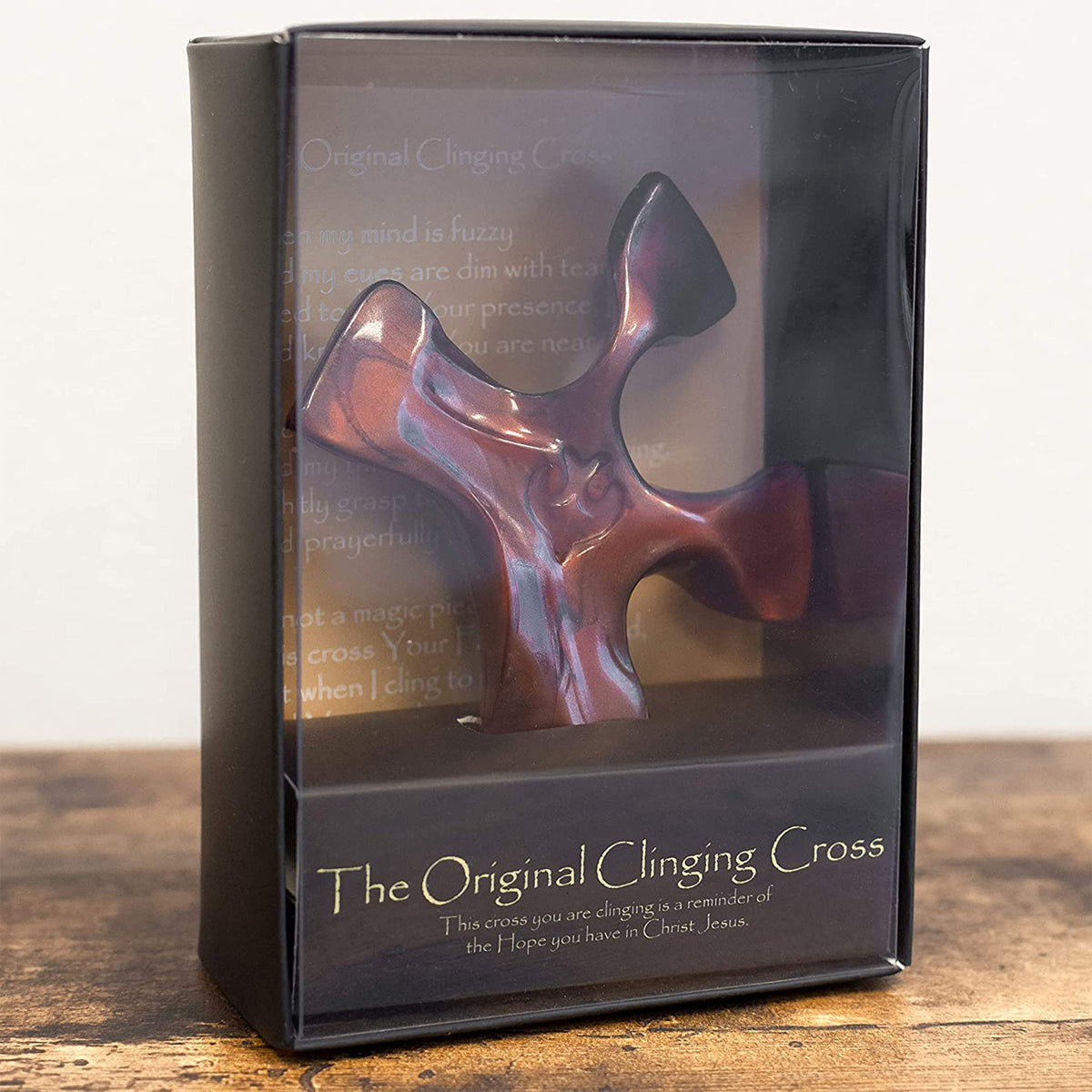 Clinging Cross 3x4 size fits comfortably in the hand.