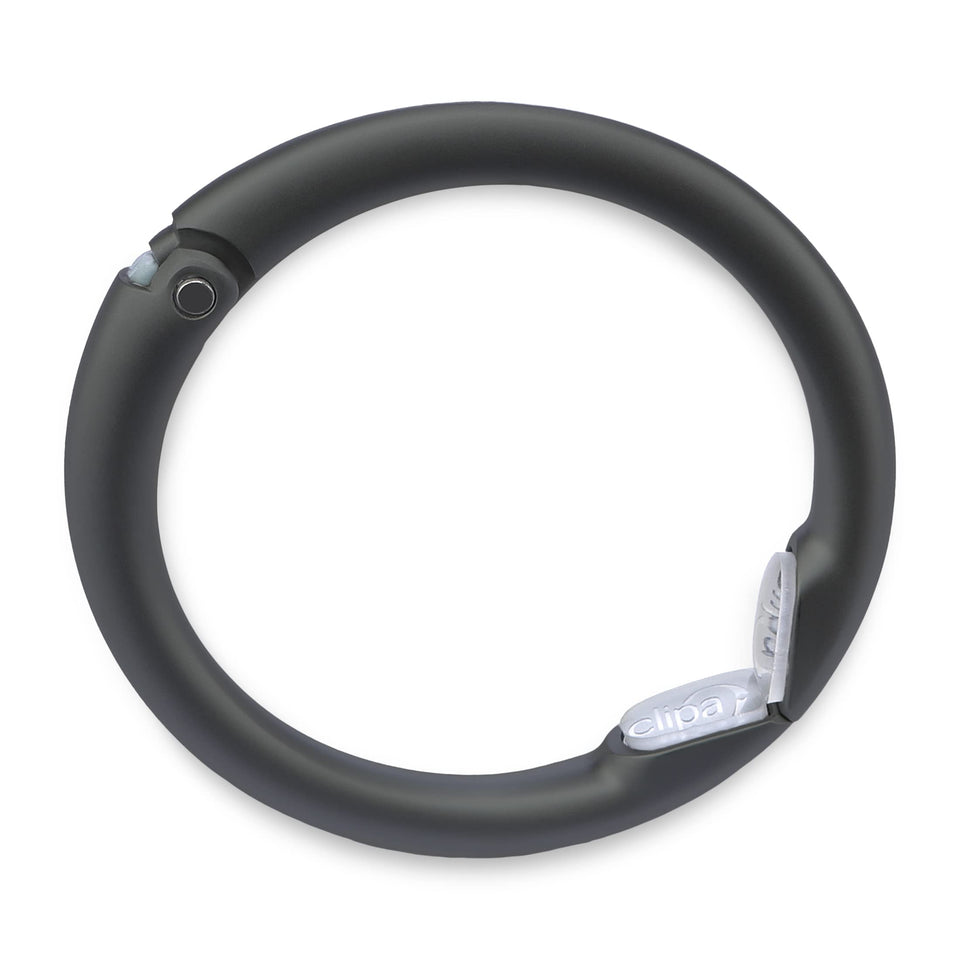 Clipa bag hanger in matte black PVD with hook for space-saving storage.