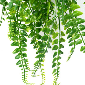 Plastic leaves and iron stems enable versatile outdoor fern arrangements.