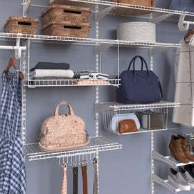 ClosetMaid wire hanging basket in pantry keeps items within reach.
