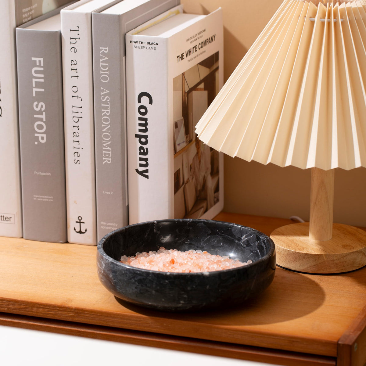 CM CHIC MONDAY key bowl keeps coins and keys organized on a console.