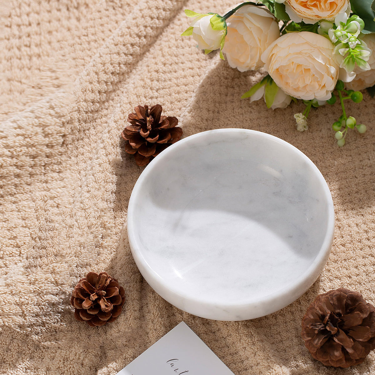 CM CHIC MONDAY large marble bowl serves as a versatile centerpiece.