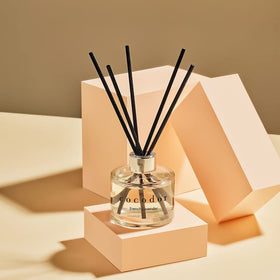 Cocod'or Signature Reed Diffuser 6-7oz bottle demonstrates long-lasting fragrance.