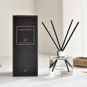 Cocod'or Signature Reed Diffuser on bathroom shelf creates refreshing atmosphere.
