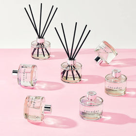 Cocod'or Signature Reed Diffuser bottle and sticks on shelf for ambient decor and scent.