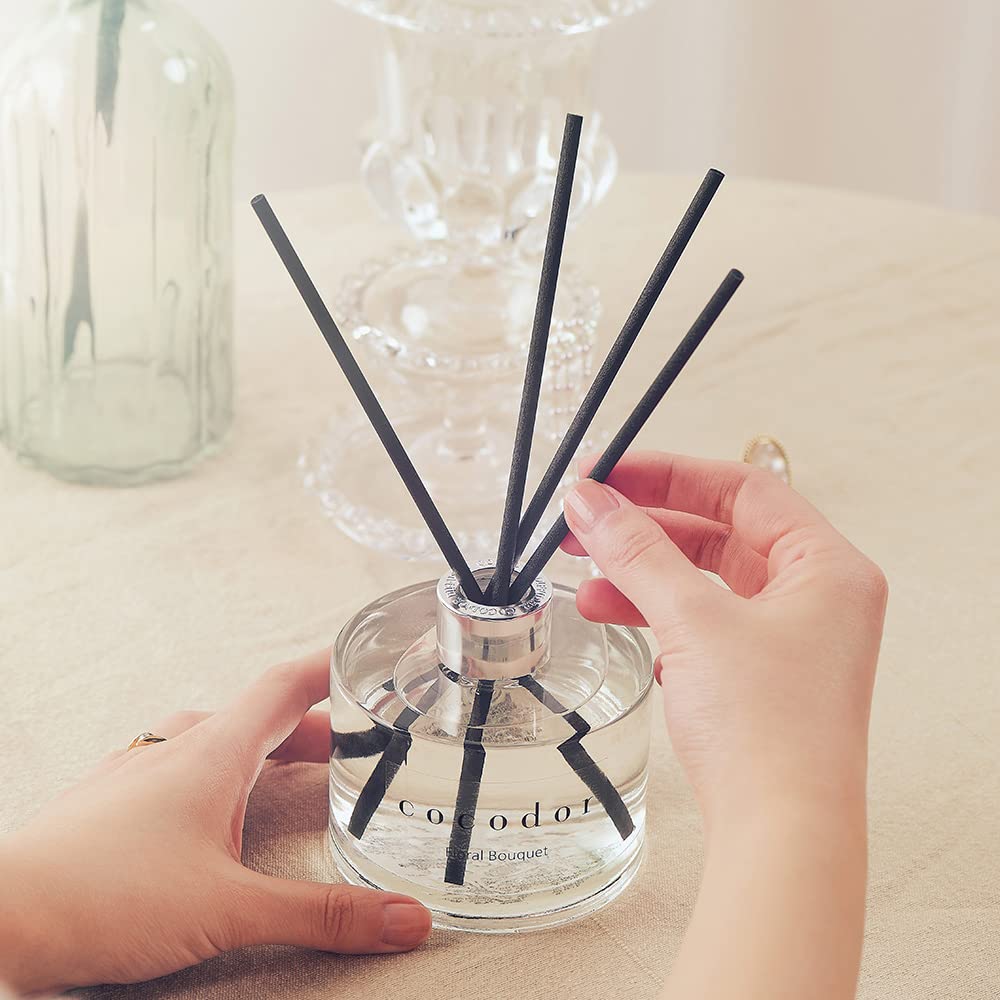 Cocod'or Signature Reed Diffuser cap detail adds elegant touch to display.
