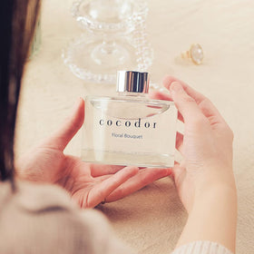 Cocod'or Signature Reed Diffuser sticks soaking signals easy setup and scent release.