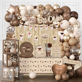 Cocomigo tiny bit older banner adds playful sophistication to birthday decor.