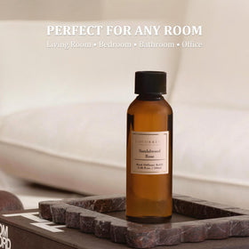 COCORRÍNA bathroom diffuser setup with refill bottles.