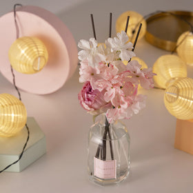 COCORRINA Cherry Blossom diffuser on a shelf adds subtle fragrance